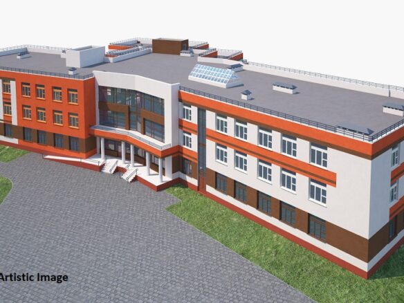 Modern school building with glass windows.