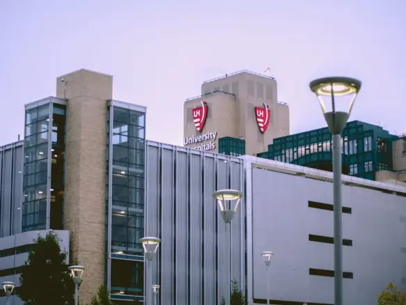 People walking in modern real estate park